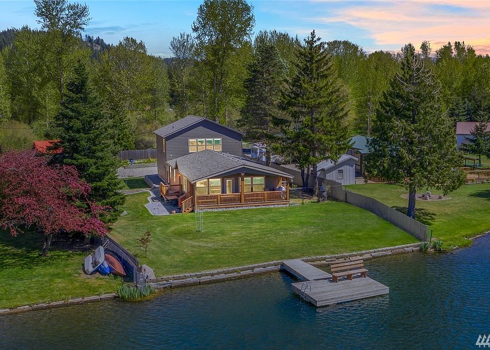 Nearly new home on Wild Duck Lake, with Detached shop, garage, & studio!