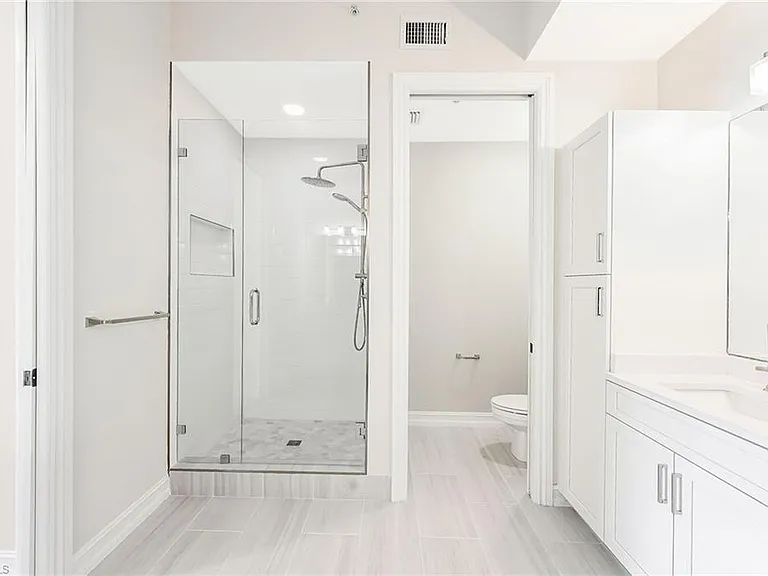 Master Bath and Shower with his and her sinks