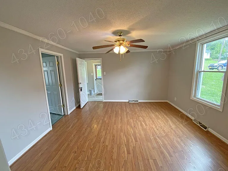 Family Room / Den - Wood and Laminate Flooring Throughout Home (No Carpet)