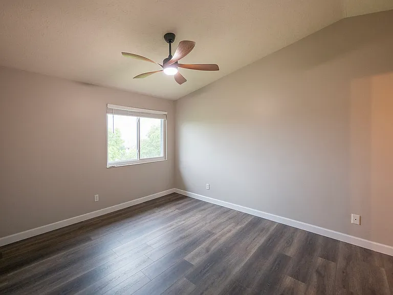 Main Bedroom with Vaulted Ceiling and New Ceiling Fan