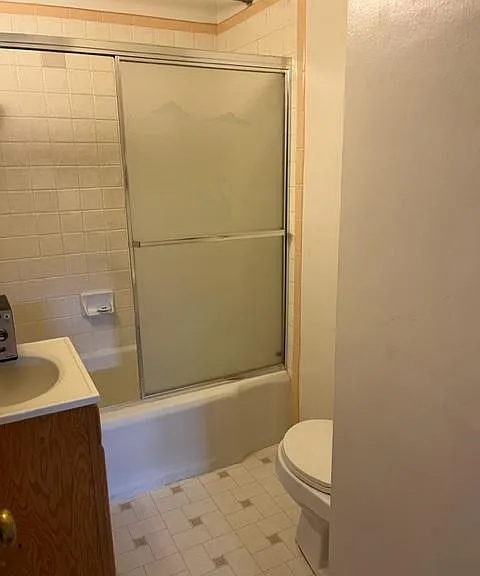 front bathroom with tub