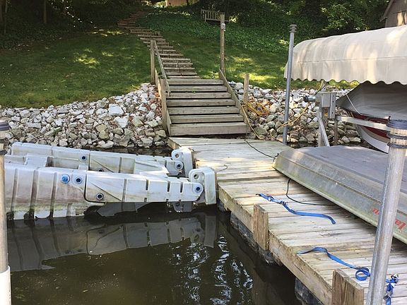 Dock & steps to lake house.