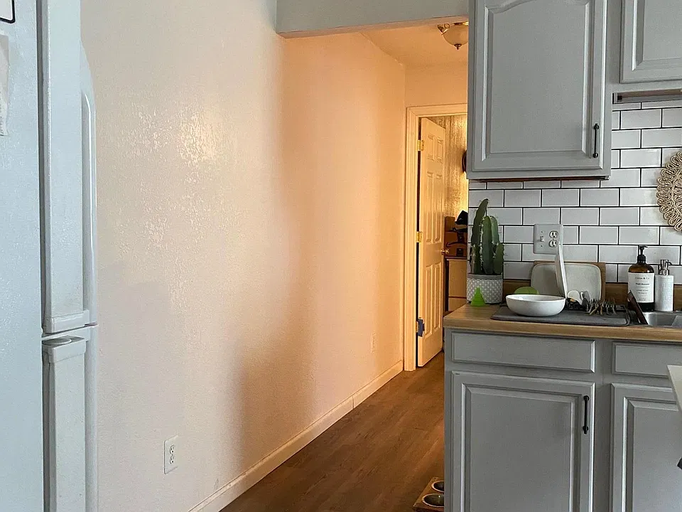 Hallway to bathroom and bedroom