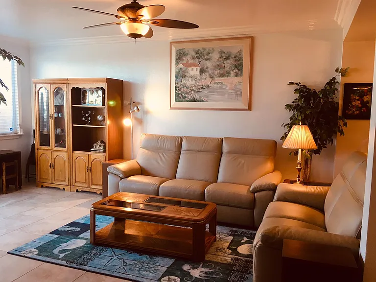 ocean front living room with private patio/balcony mostly for you!.
