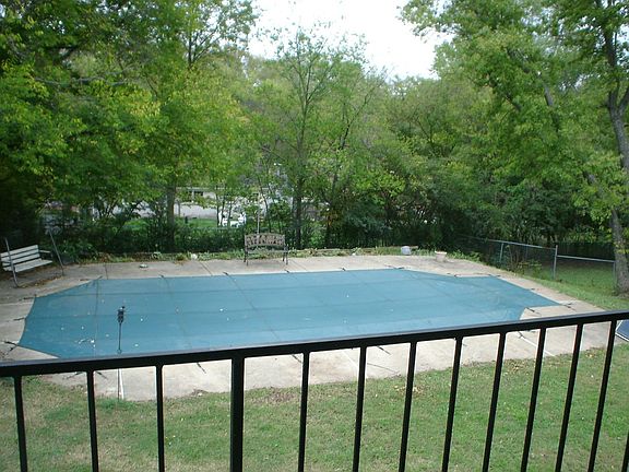 Great fenced backyard with swimming pool!