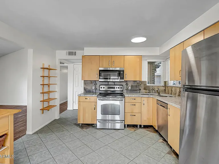 5601 W Carol Ave — Photo 3