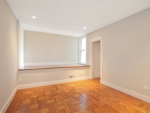 bedroom with big window seat