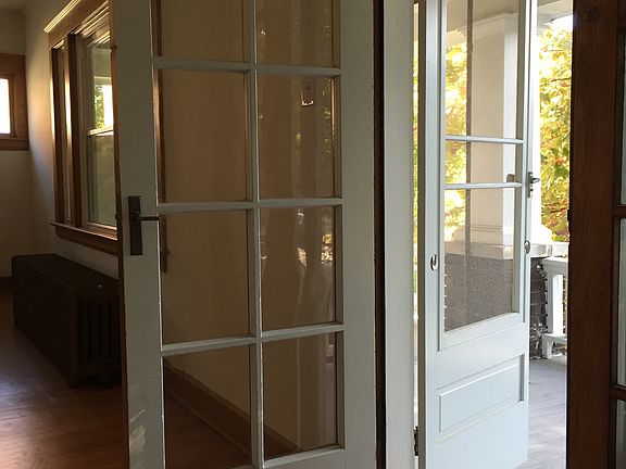 Screened doors to front porch