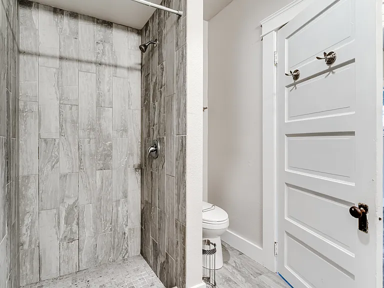 Oversized tile shower.