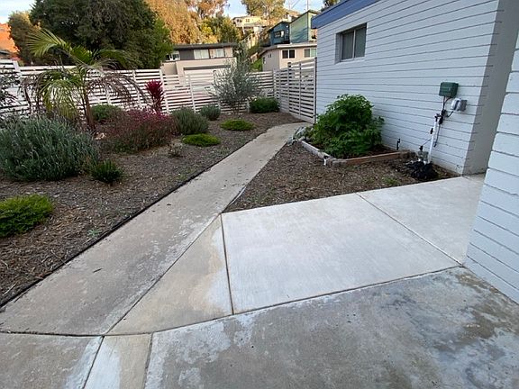 Private front yard with access to garage