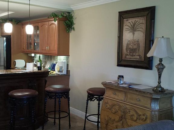 Kitchen Bar has Leather stools