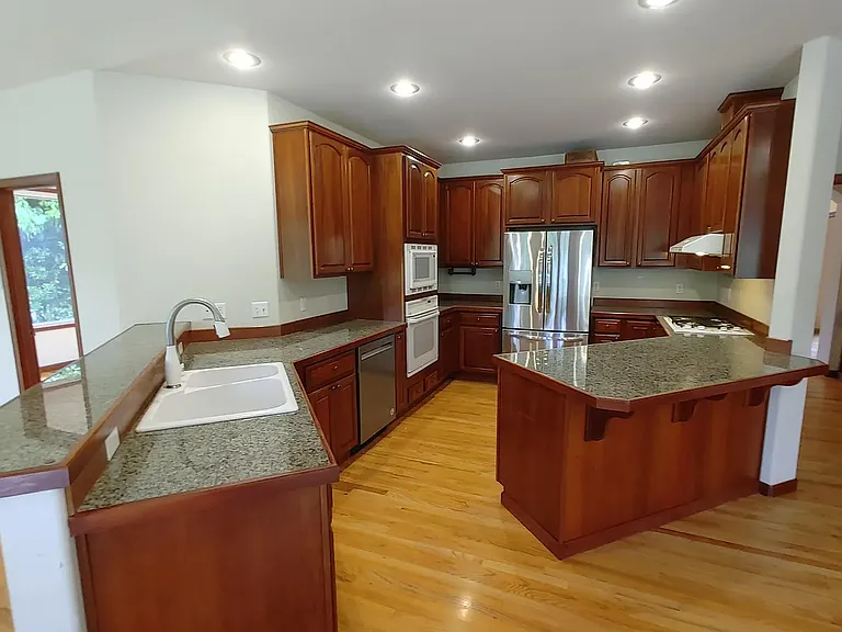 white appliance in this photo has been replaced with new stainless