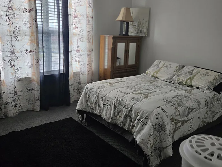 Bedroom 4: Full bed, dresser, wide closet, area rug, remote-controlled ceiling fan, curtains.
