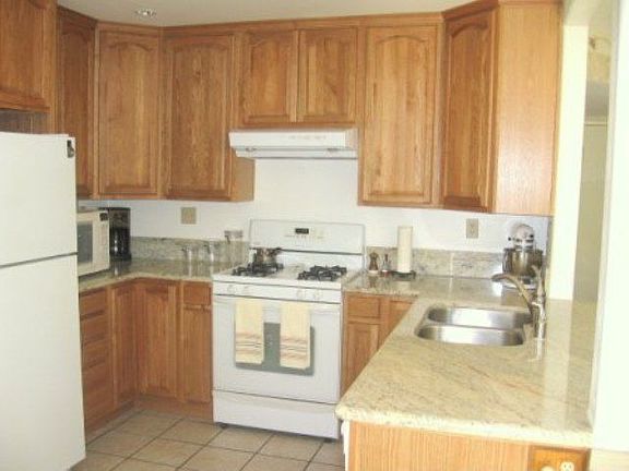 Updated kitchen cabinets and countertops.