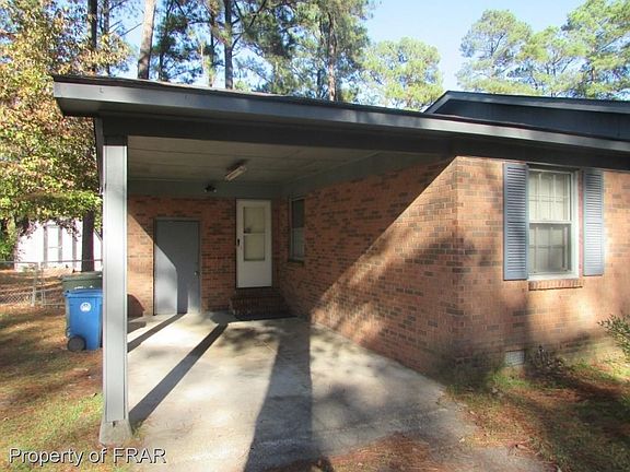 Single Carport with storage