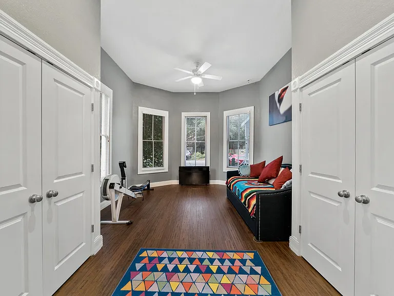 Flexible bedroom/office has two enormous closets.