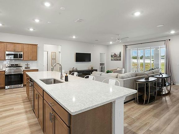 This spacious home features a sunny, open-concept layout - Summerlyn II by Highland Homes