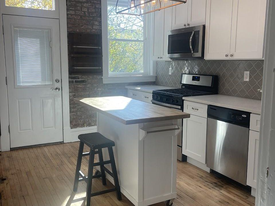 View into kitchen to back yard