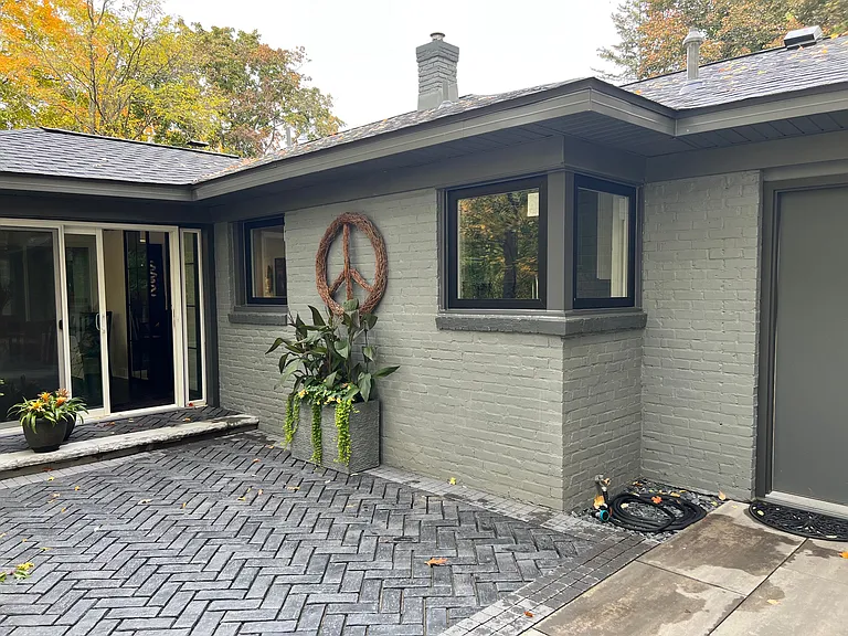 patio with doors to dining room and garage