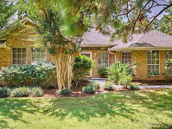 Beautiful landscaping greets you.