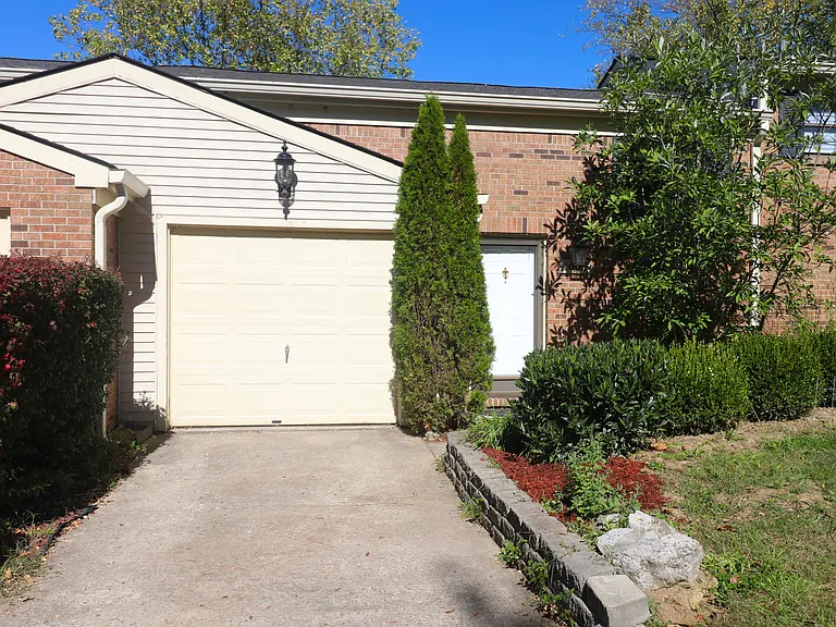 One--car garage plus driveway and 1 parking space on the side.