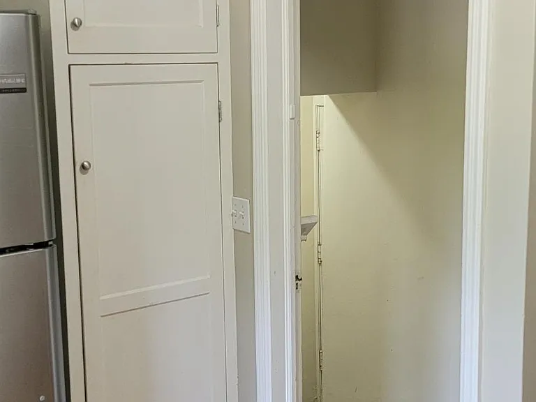 This door in the kitchen leads to the basement, garage and screen porch. We'll take a look down there when we finish the first floor.