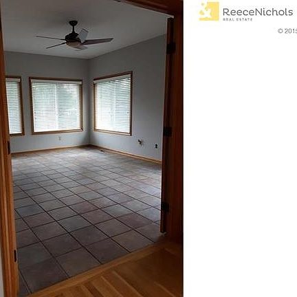 Sunroom off Kitchen w/oversized windows let in an abundance of natural light.