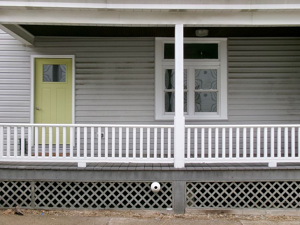 Apartment 1 entry with covered porch