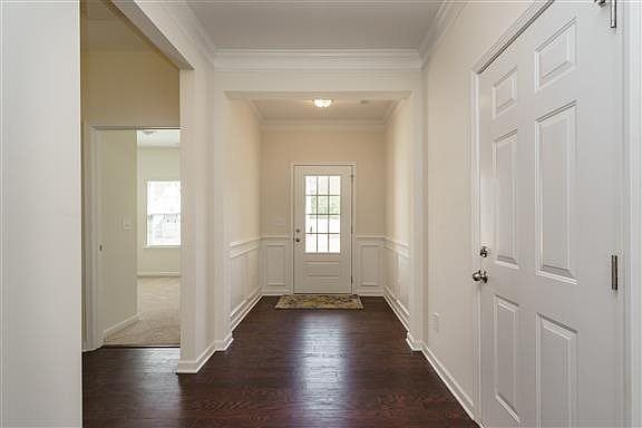 MODEL HOME PICTURED- Nice Wide Foyer with Chair Rail & Wainscoting Included!
