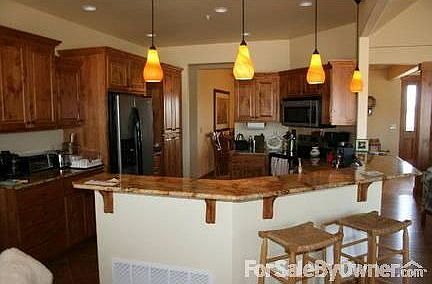 Roomy Custom Kitchen : Beautiful Granite countertops and custom Alder cabinets