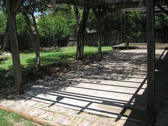 Large concrete & brick patio