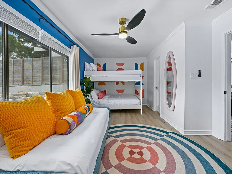 Bunk room Unit A comes decked out with custom curated pieces which match the duplex's retro fun feel