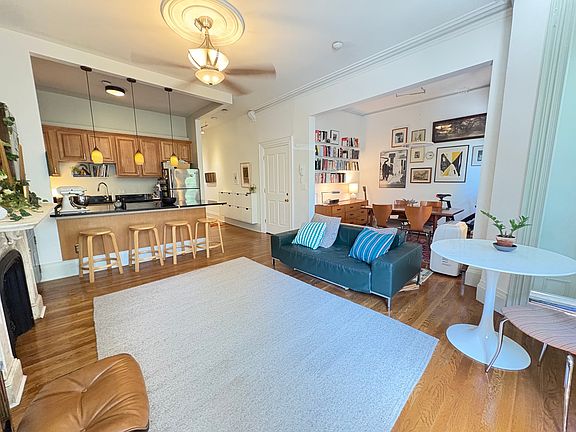 living room towards kitchen and dining area