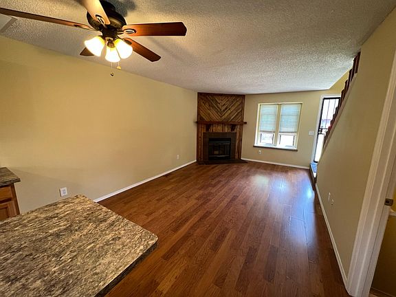 Open floor plan from Kitchen to family room with fireplace