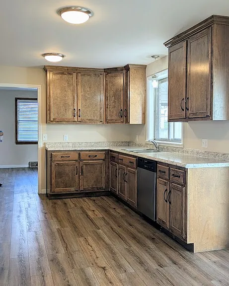 The kitchen was renovated two years ago. Lots of storage and counter space. 18x10.