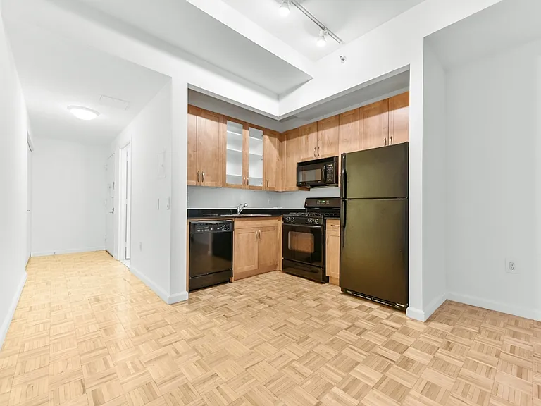 63 Wall St #202 — Photo 3