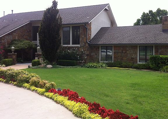 Front, circle drive, landscaping