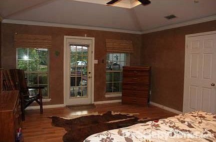 Master Bedroom
						:
						14'x18' with door to the back deck and a spacious walk in closet