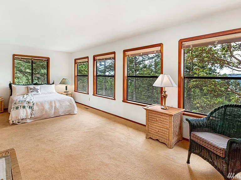 Upstairs bedroom. Could be considered a 2nd primary bedroom. Very large with great views.