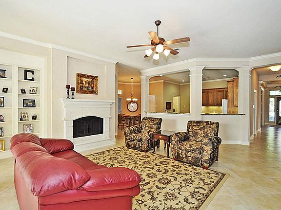FAMILY ROOM overlooks COVERED PATIO