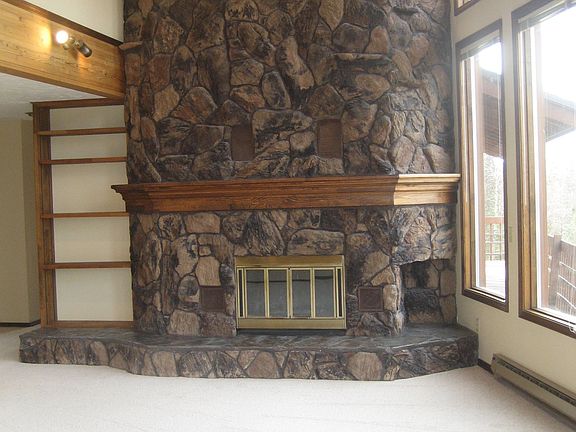 2 Story Handsome Rock Fireplace