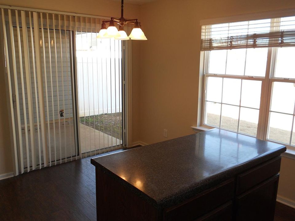 Dining area overlooks the rear yard