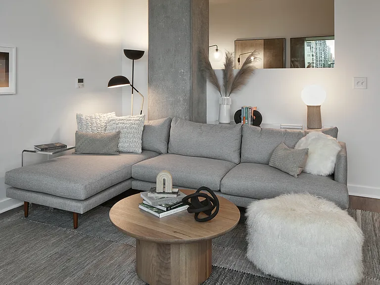 Apartment living room with wood-style flooring.