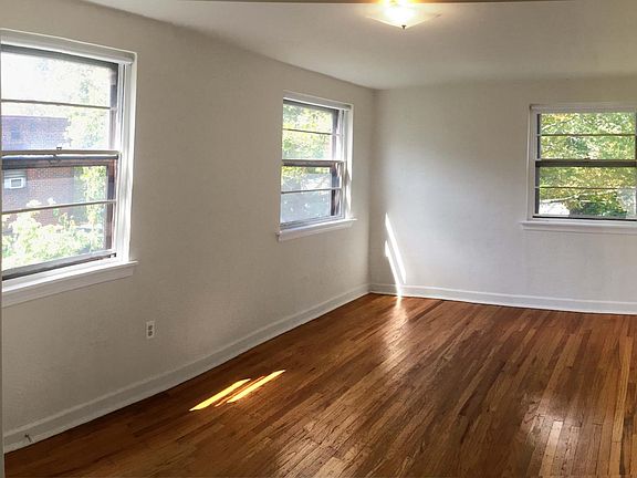 Bright sunny bedrooms with wood floors