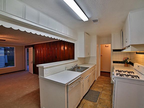 12x12 slate tile and a new gas stove are just a couple of the many upgrades to this fabulous home!