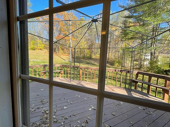 Back Deck w Trellis overlooking Backyard