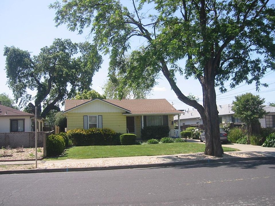 Cheery home with front porch great location