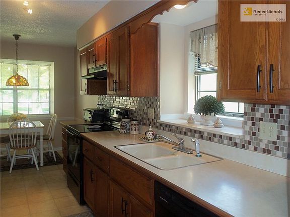 Tiled backsplash, new handles and Eat-In Kitchen.