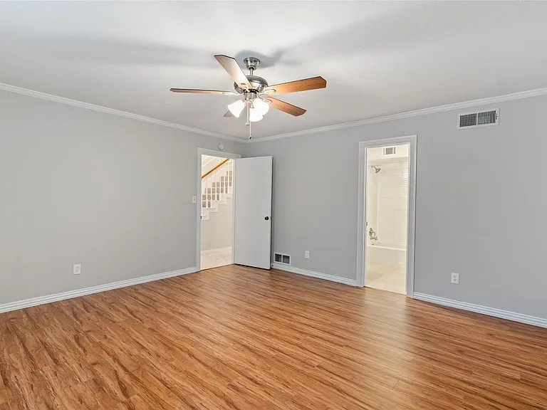 Large primary bedroom is on the first floor with an attached bathroom.