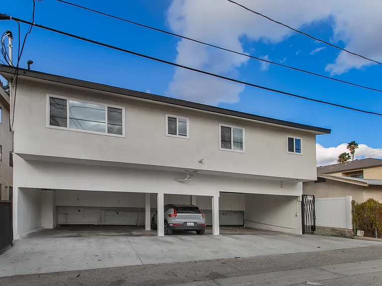 Backside of Property (Assigned Parking & External Storage)